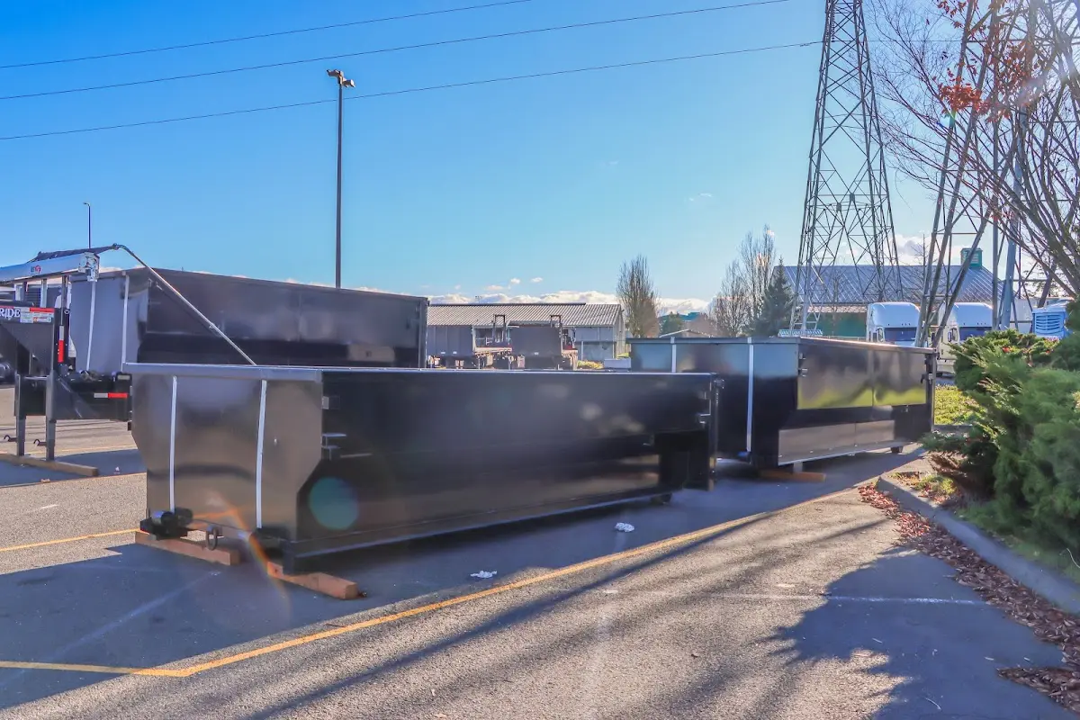 Roll-off dumpster ready for waste disposal at job site for Concrete Dumpster Rental in Dayton